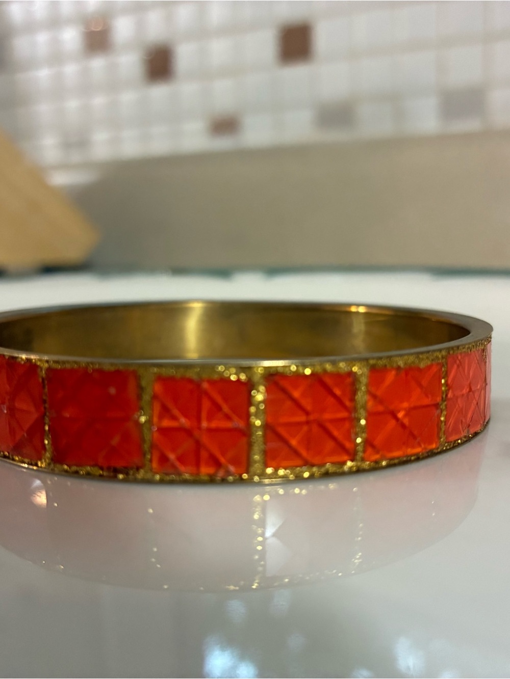 Vintage Gold Tone Bangle Bracelet with Orange Inlay